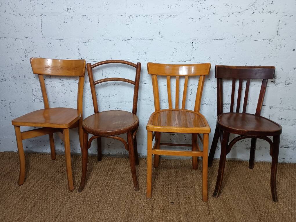 Set of 4 mismatched vintage Fischel bistro chairs
