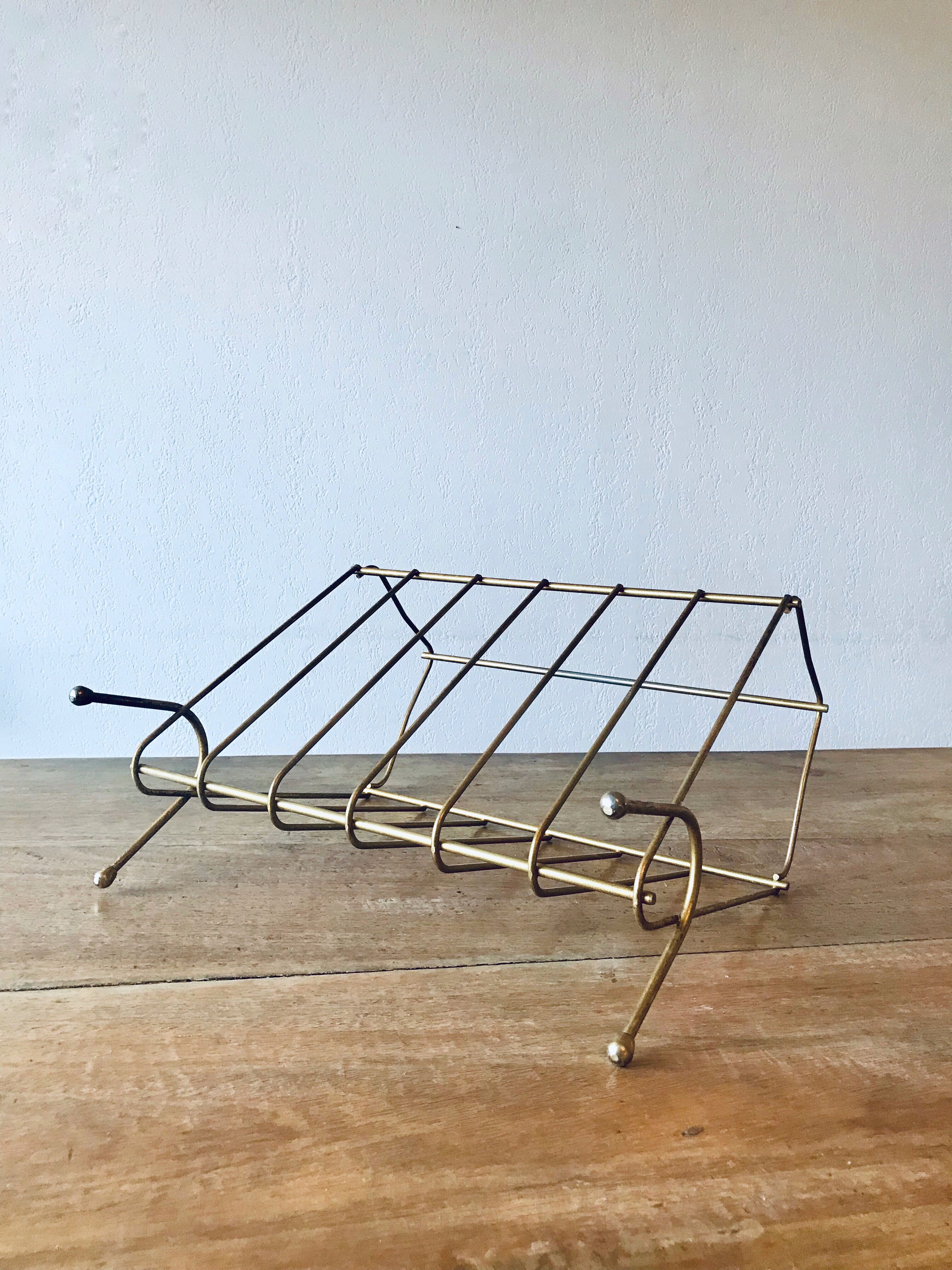 Porte-revue vintage en laiton doré