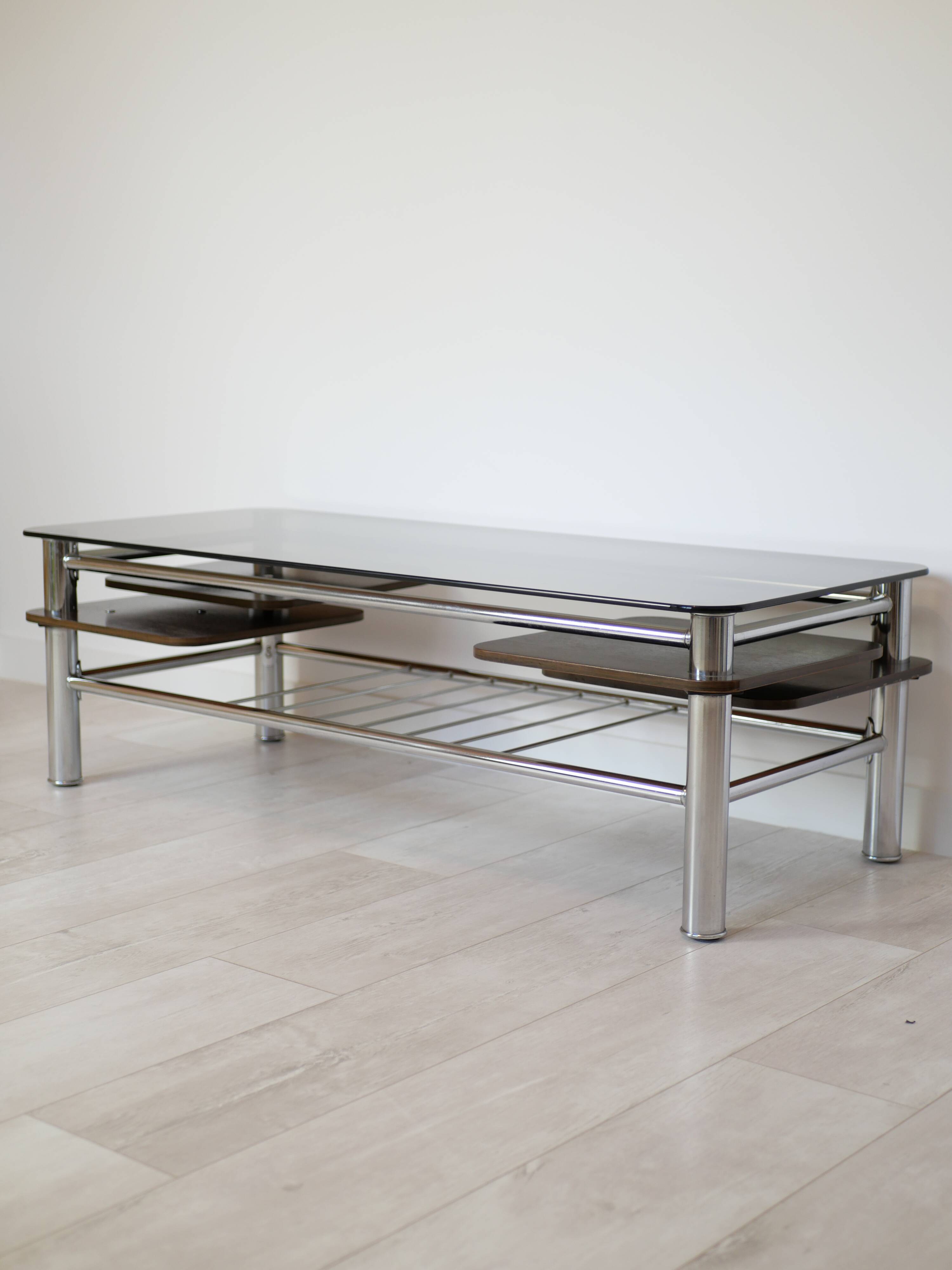 Chrome metal coffee table with smoked glass top.
