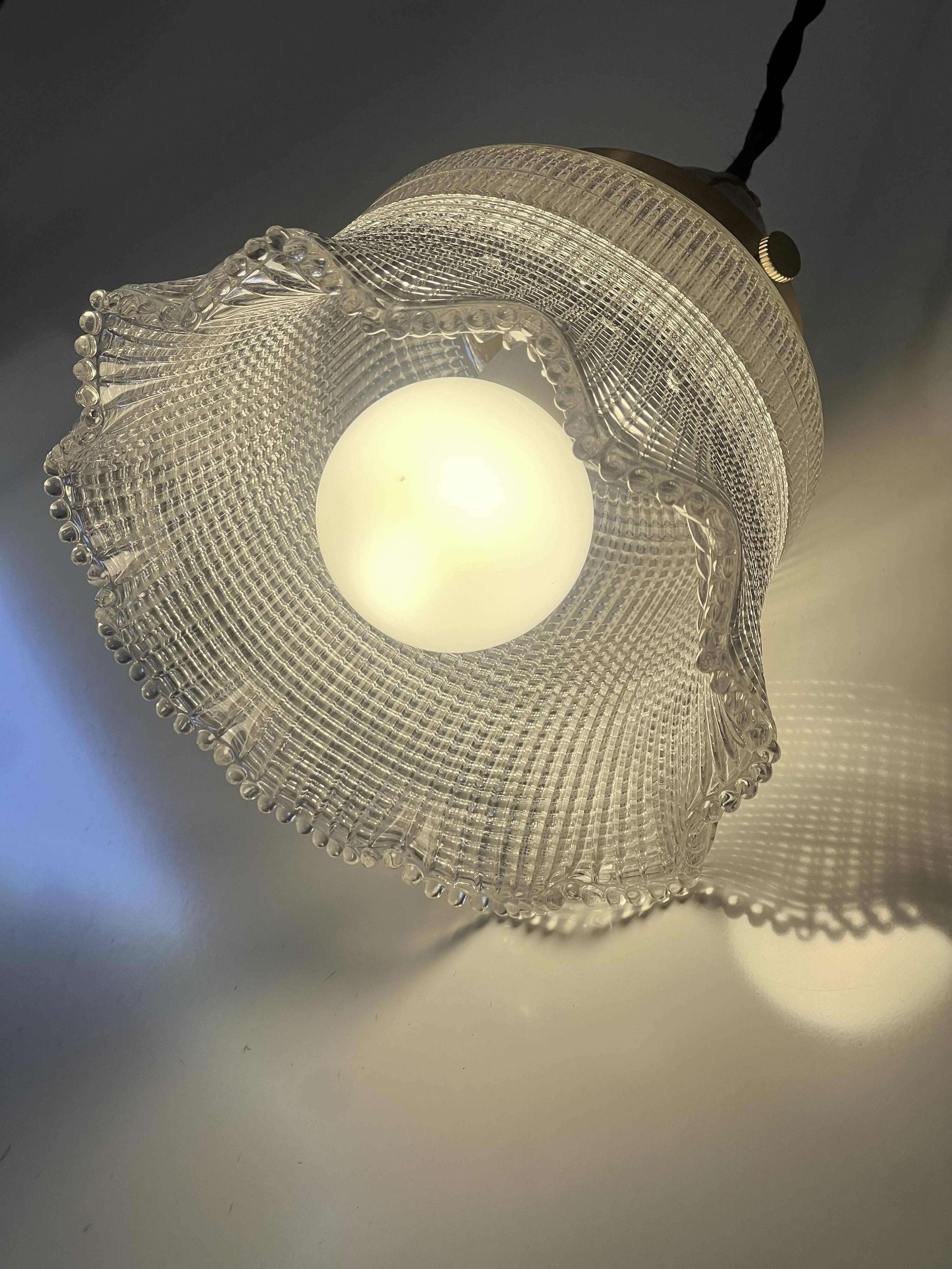 Industrial Holophane glass portable lamp with brass hook