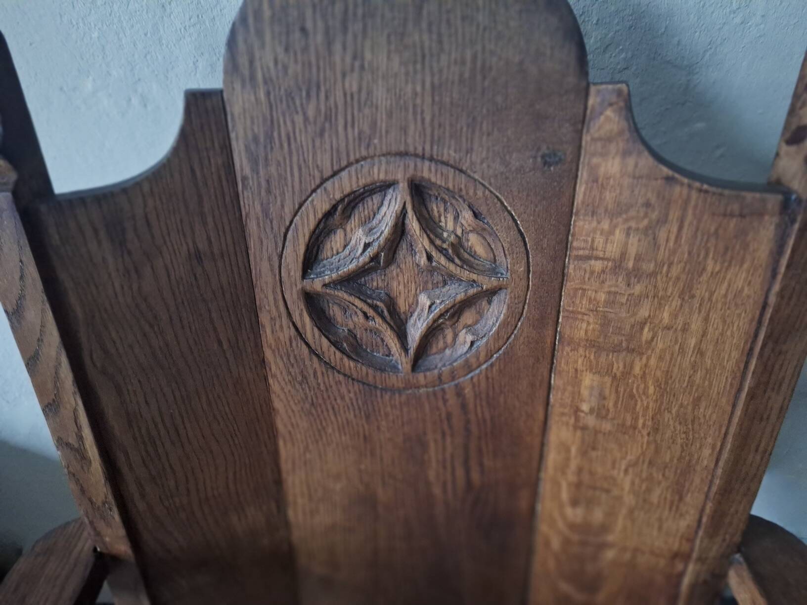 Antique arts and crafts carved oak armchair, 1910