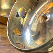 Bonbonnière, in the shape of an apple, made of brass.