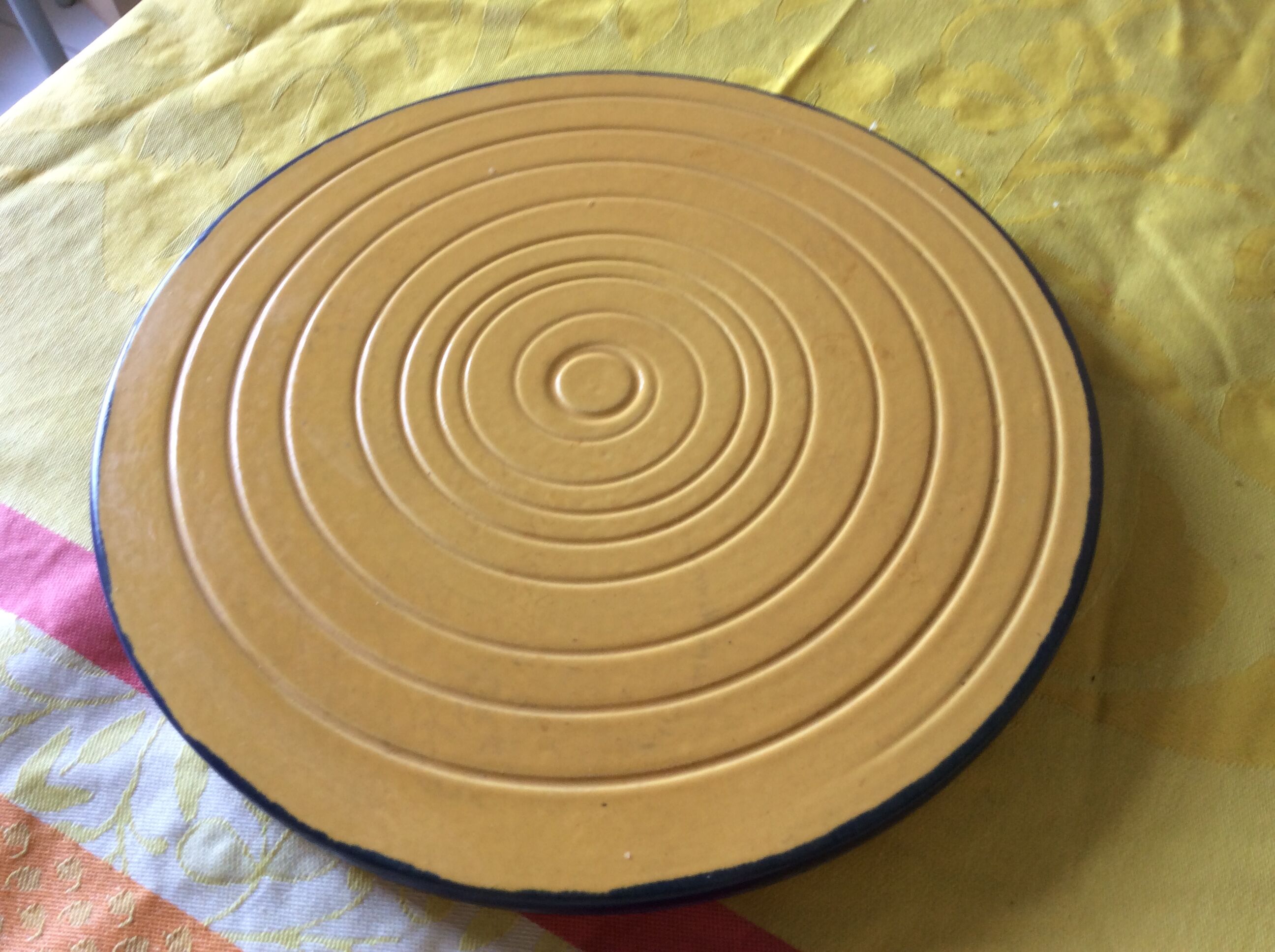 Yellow ceramic trivet