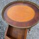 Oval bedside table in Louis XV style with marquetry.