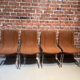 Suite of four Italian chairs in fabric and metal