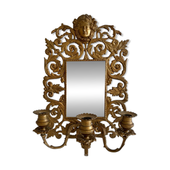 Bevelled mirror wall sconce in gilded bronze with 3 candle holders.