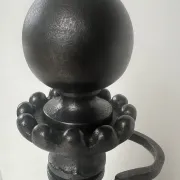 19th-century cast iron fireplace set, bar, andirons & plaque with griffins