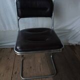 Suite de 4 chaises métal chromé et cuir noir