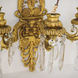 Two bronze and cut glass wall-mounted chandeliers