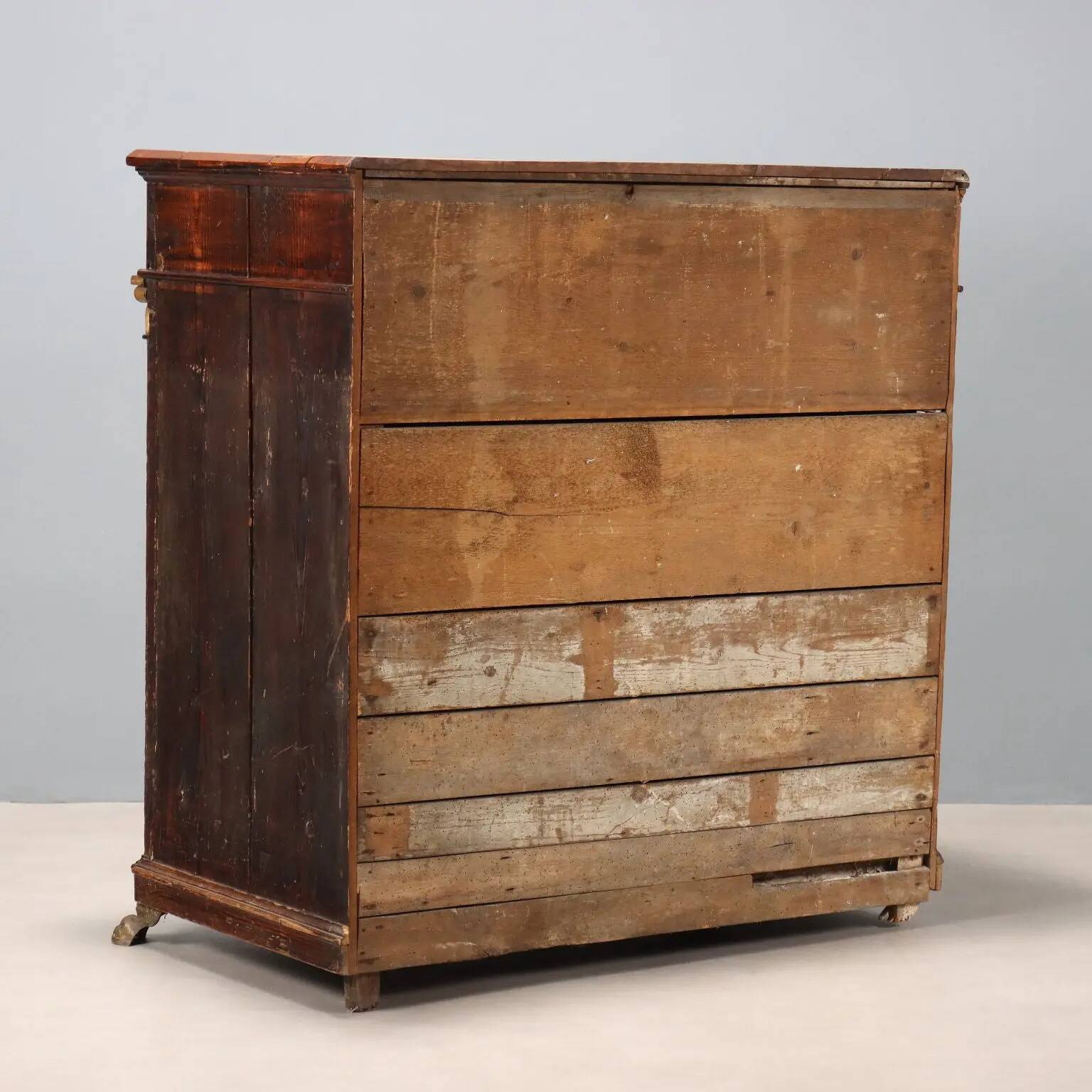 Antique walnut and fir wardrobe with drawers, Italy, 18th century.