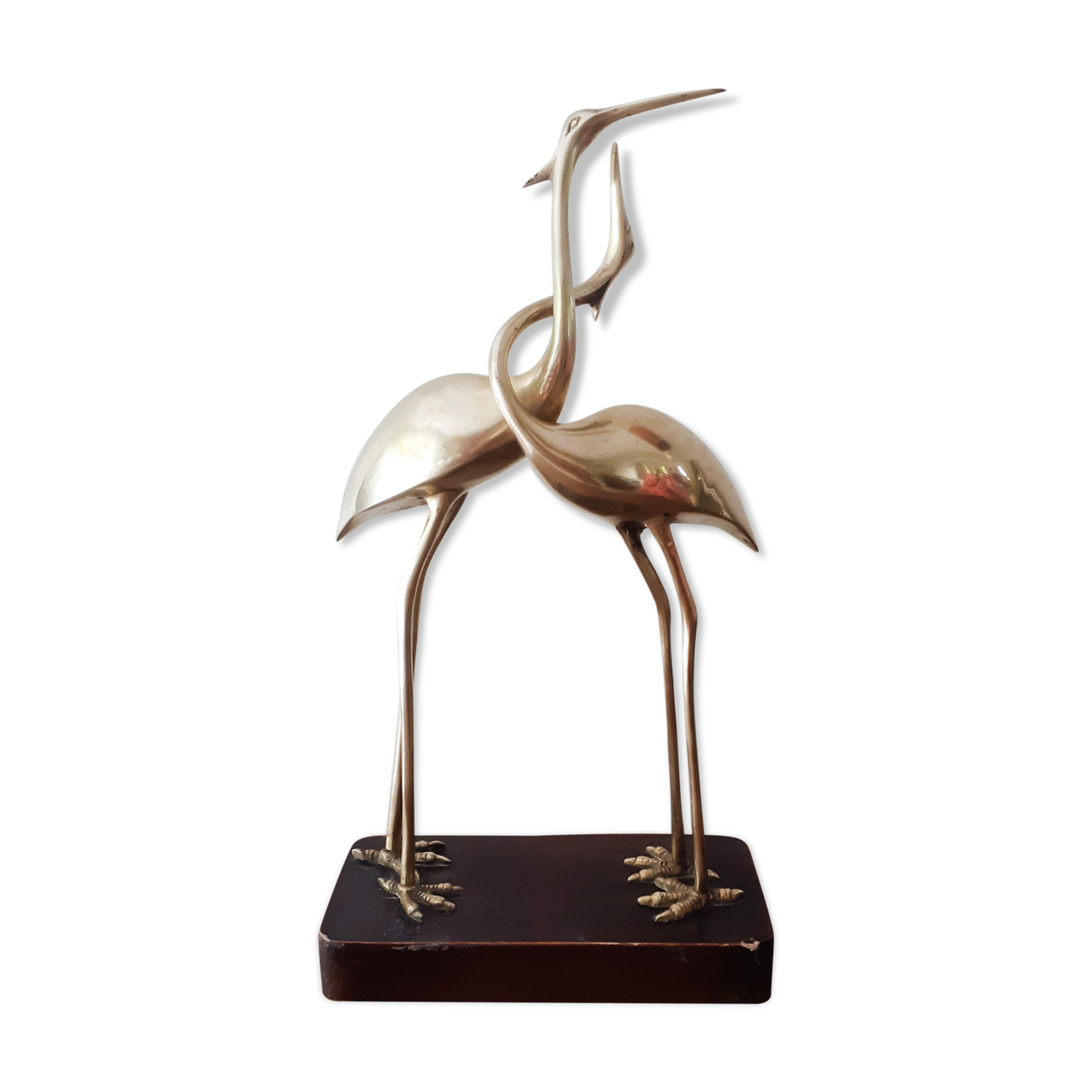 Couple of wading birds in brass on wooden base