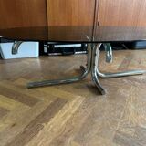 70s design oval coffee table in smoked black glass with chrome legs.