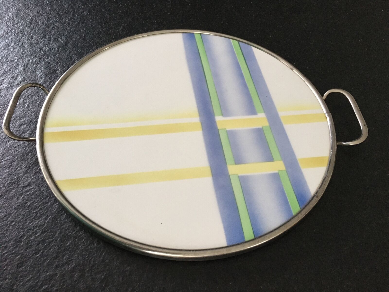 Vintage round tray with 1970s handles