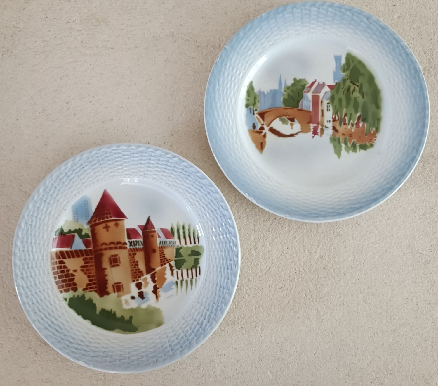 2 Saint Amand plates with castle decor