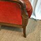 Fauteuil Bergère aux dauphins noyer