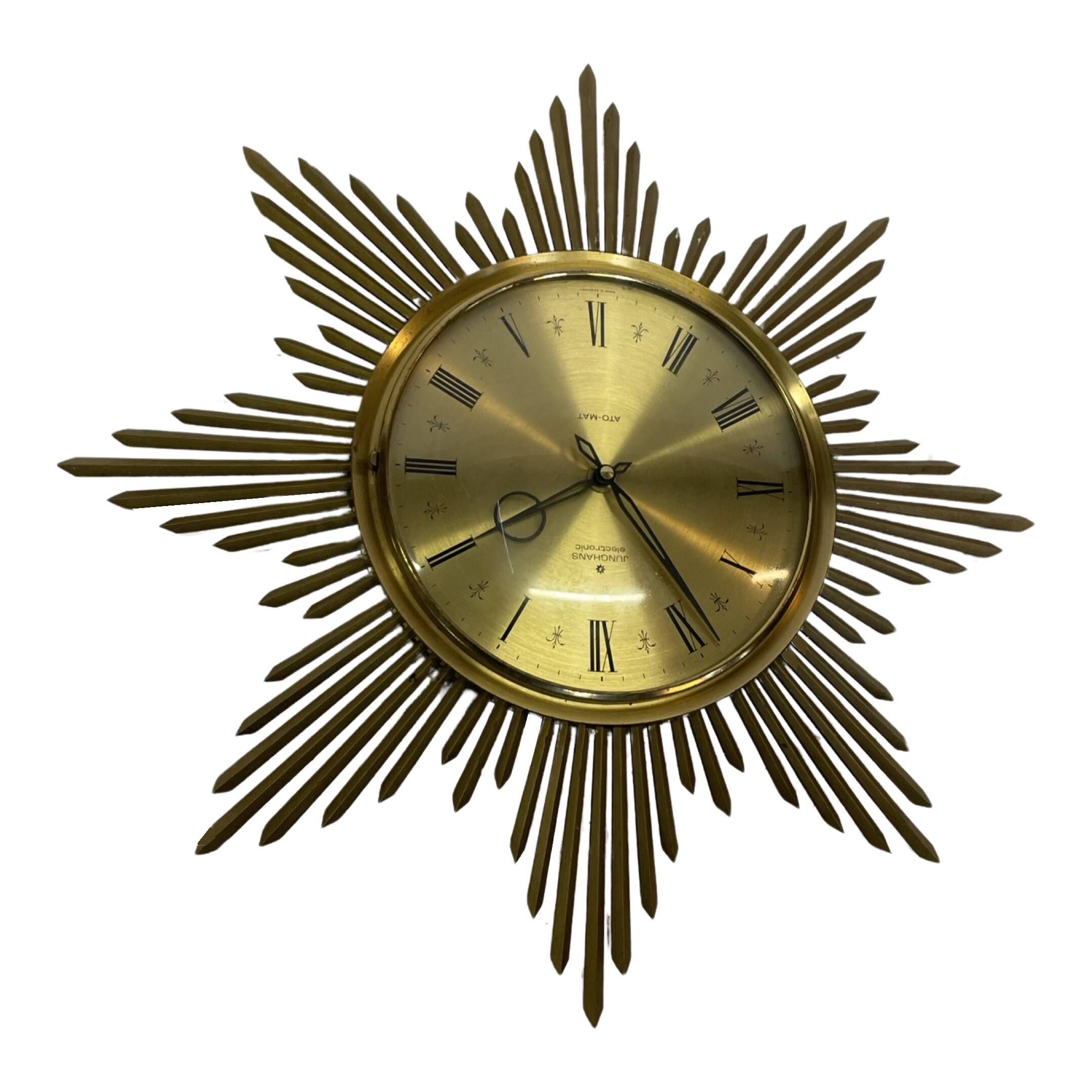 Horloge vintage sunburst de couleur dorée, design Junghans des années 1970