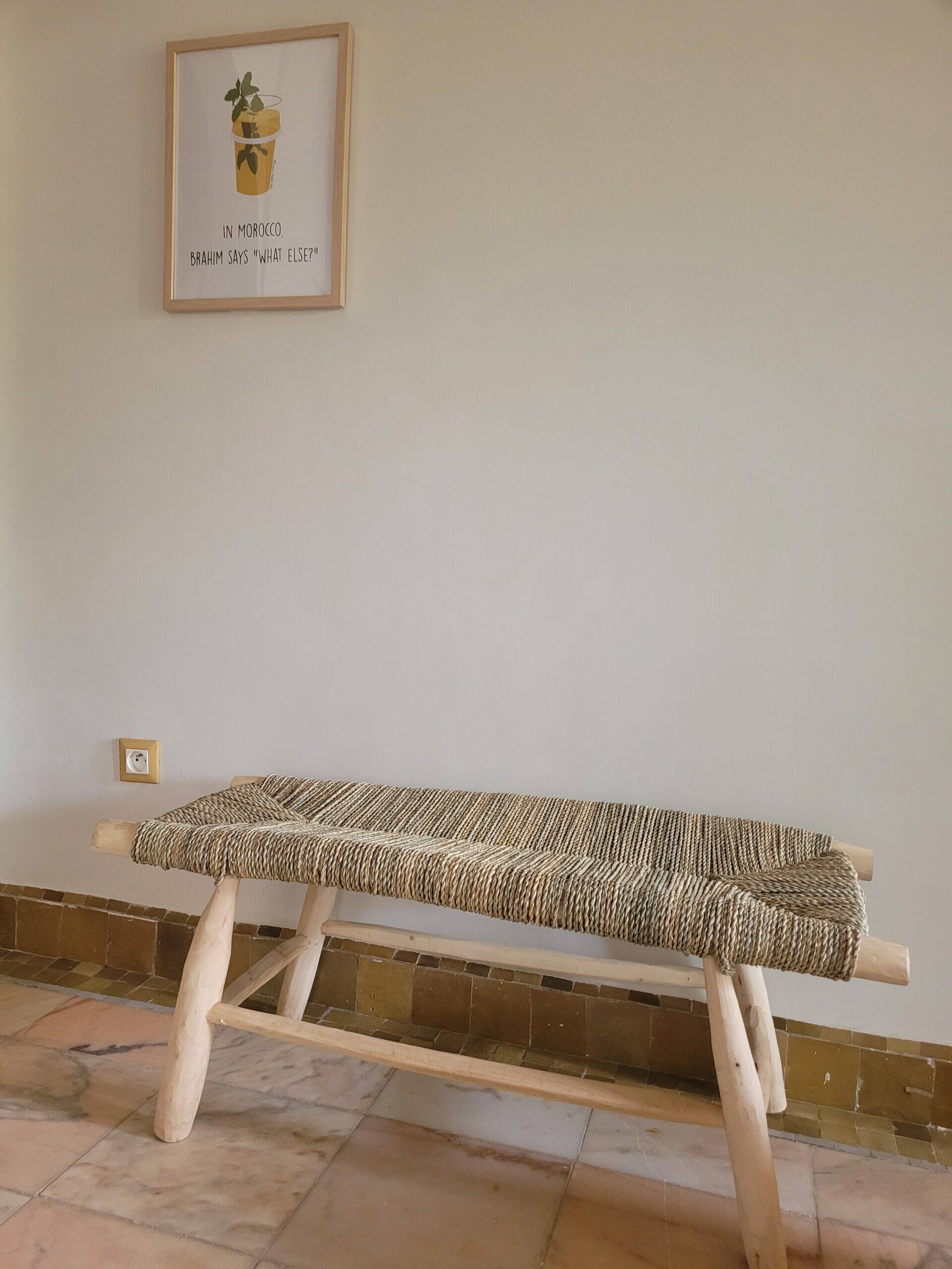 Eucalyptus wood bench and braided doum.