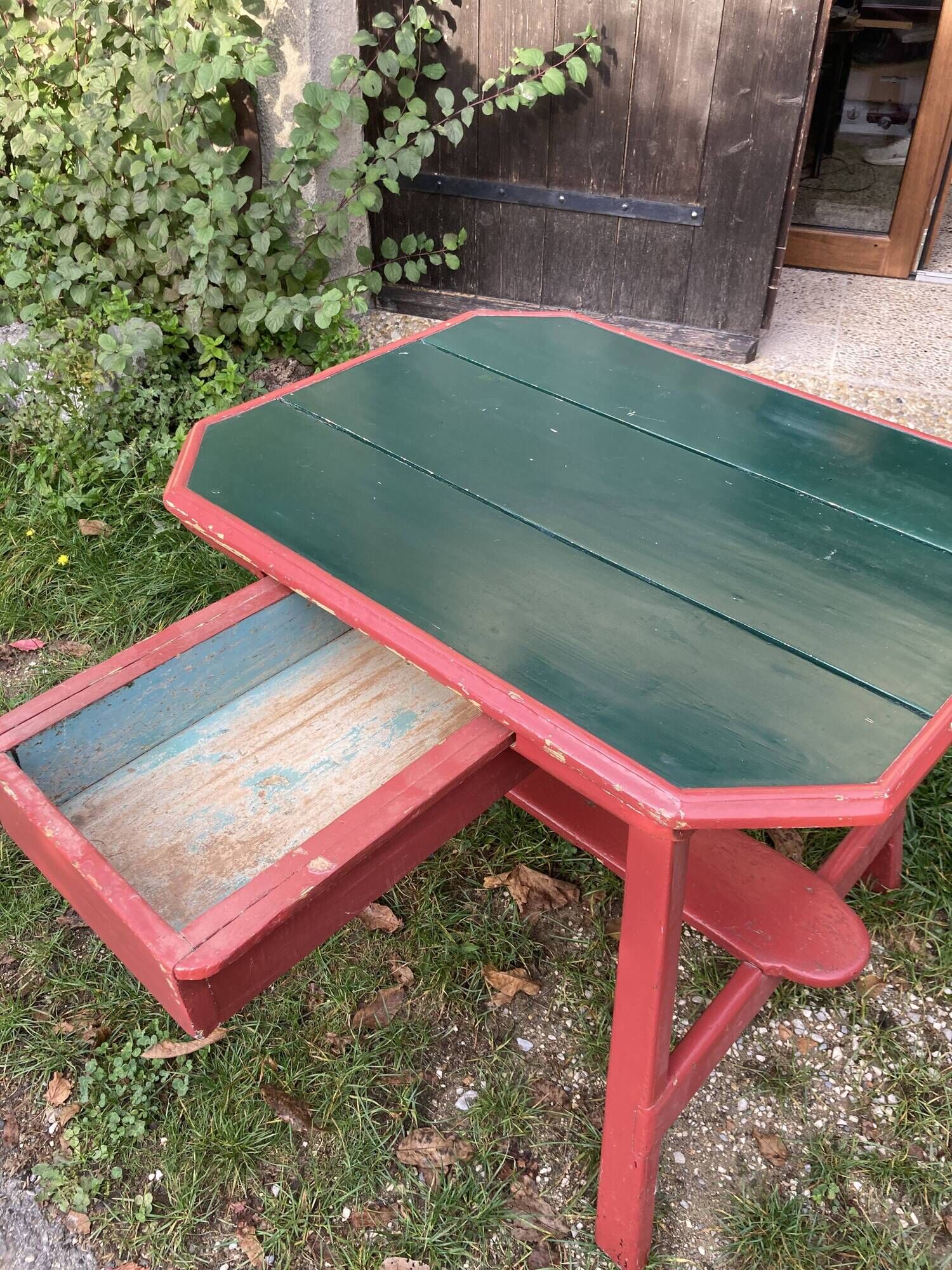 Middle table of popular art with double-sided drawer - 19th century
