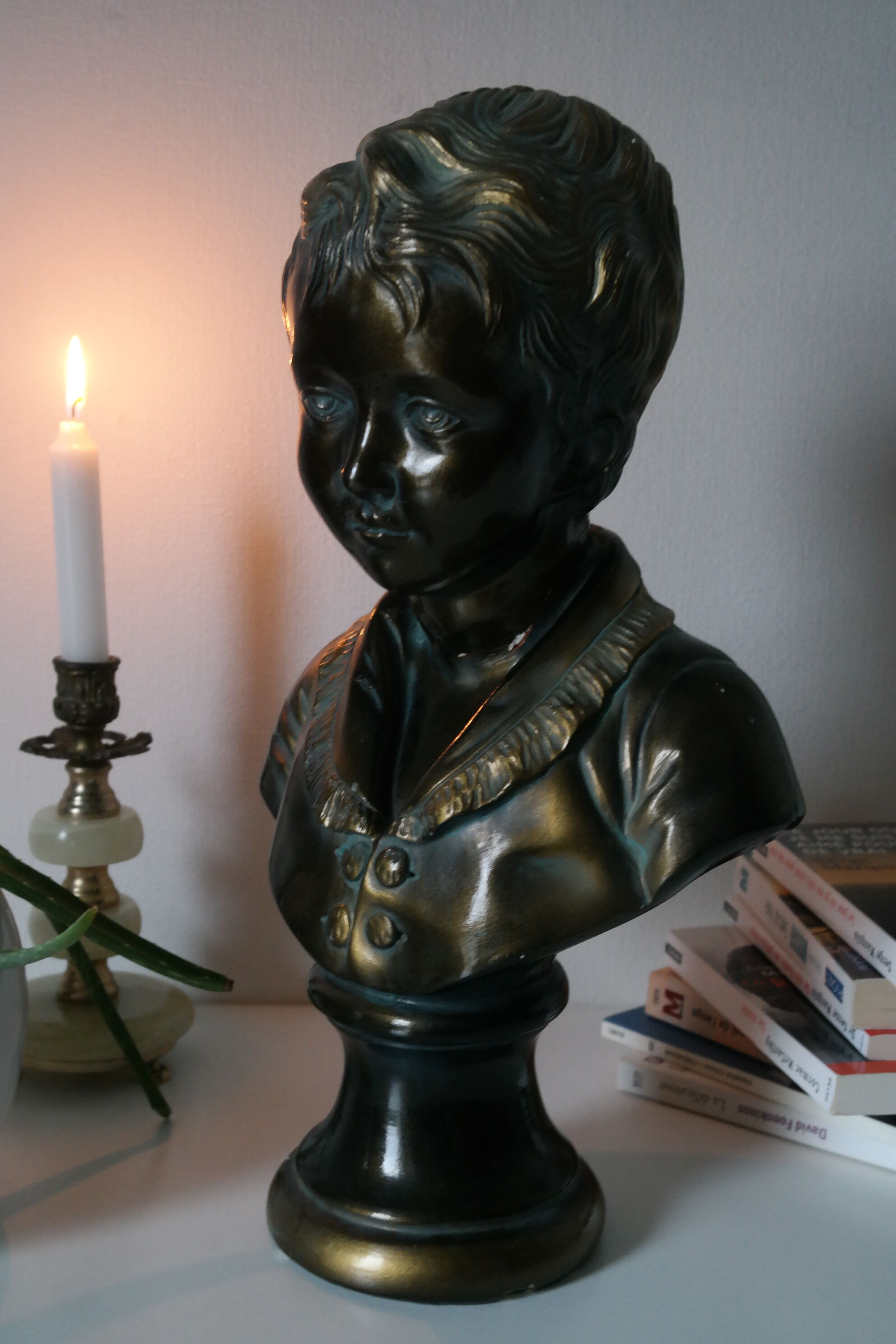 Buste en plâtre garçon patine bronze XXème