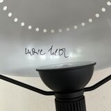 Matte black metal lamp signed by hand by its creator Marc Held