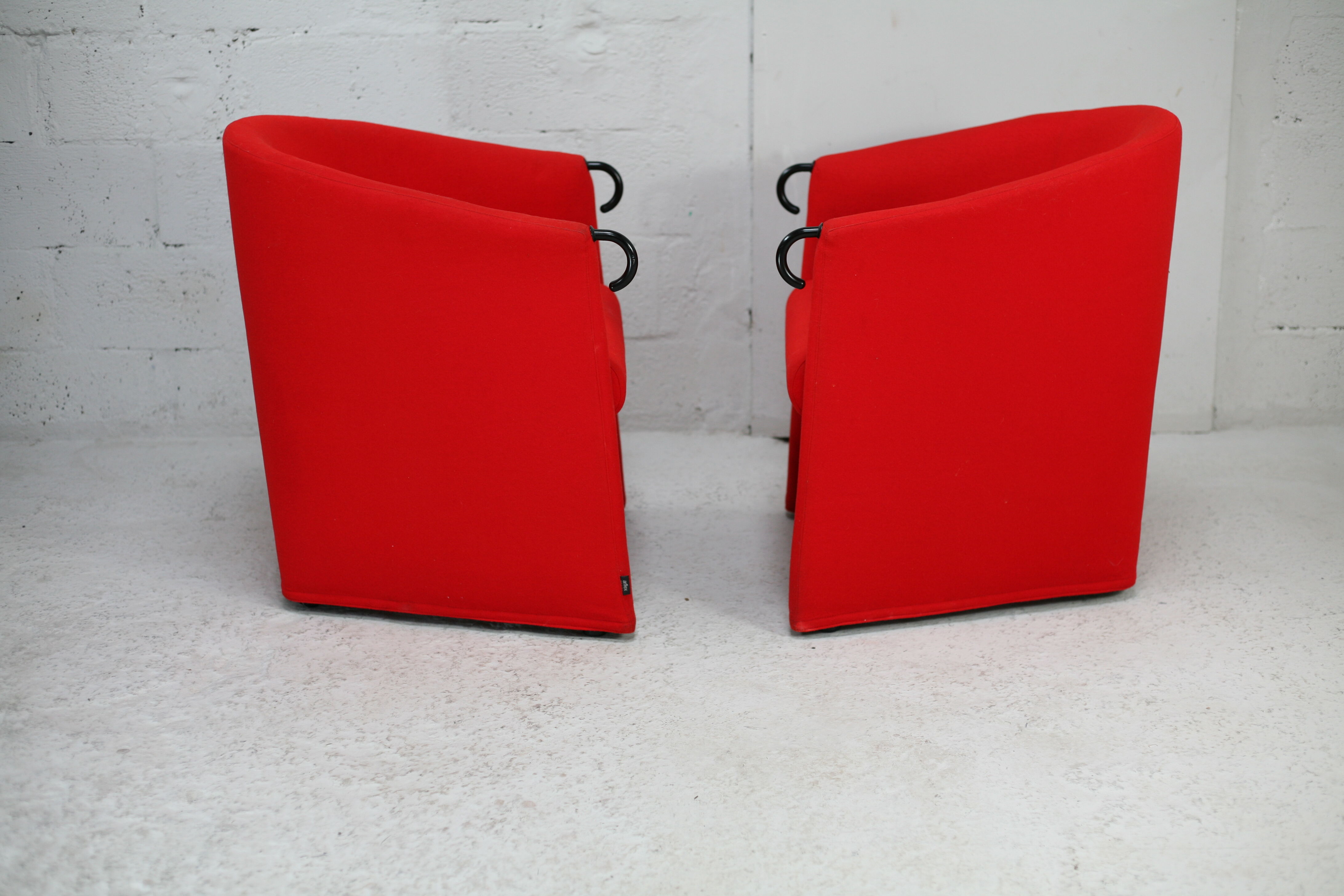 Pair of red Arflex armchairs. Italy, circa 1980