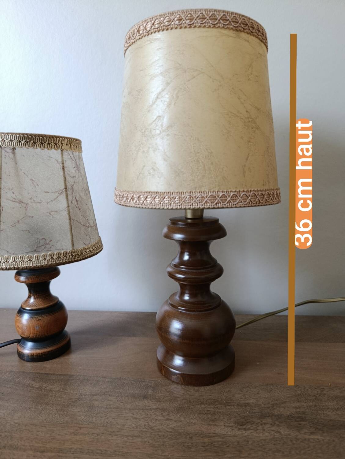 Bedside lamp with turned wooden base, chic rustic leather shade.
