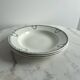 Set of 3 St Amand deep plates with green crown decoration.