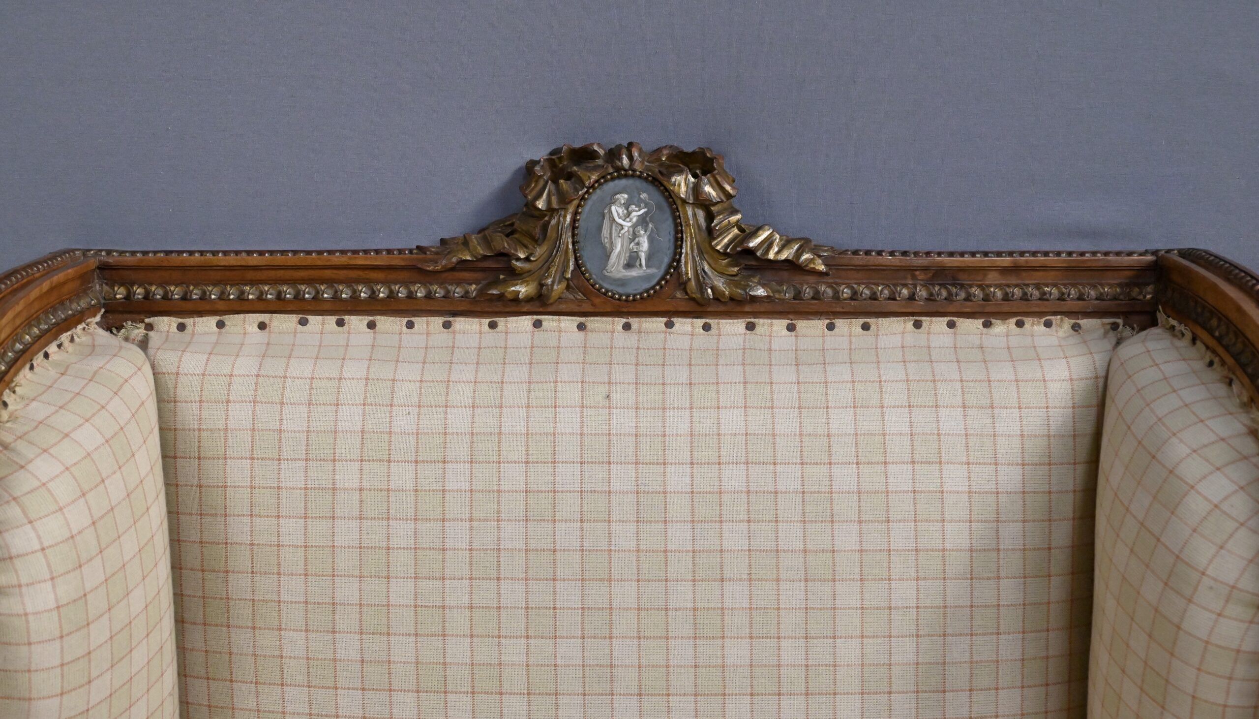 Wingback armchair in walnut, Louis XVI style – late 19th century