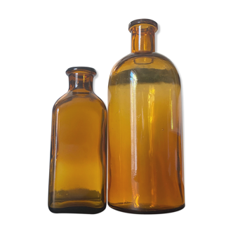 Duo of amber glass bottles