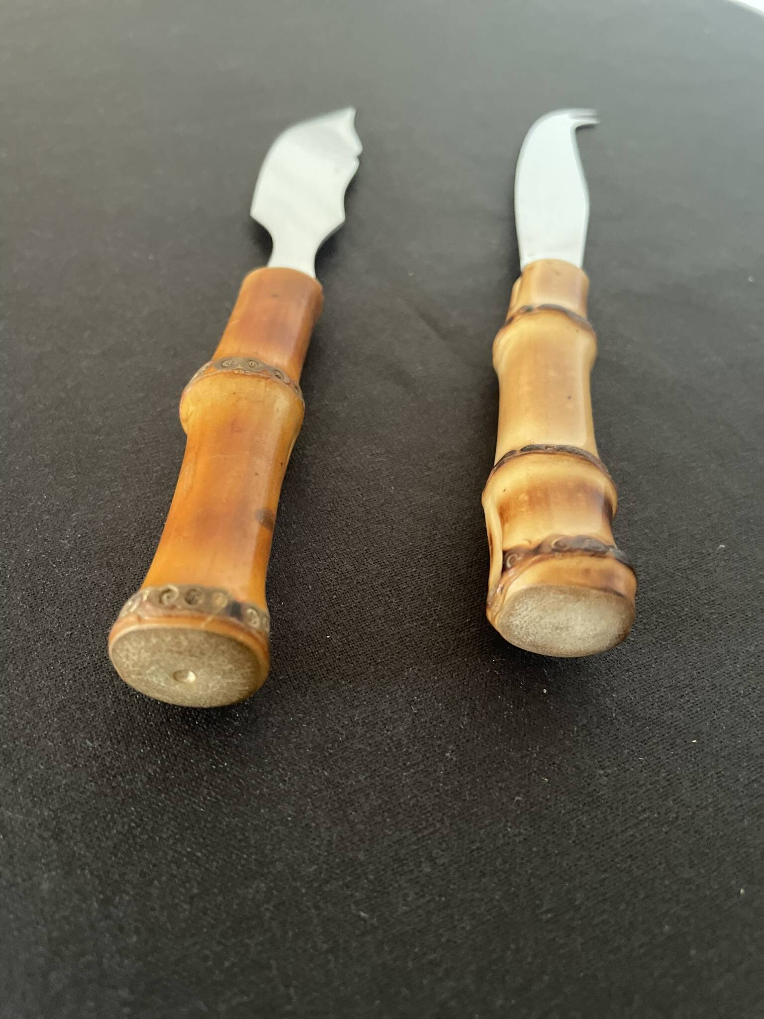 Bamboo handle cheese knives.