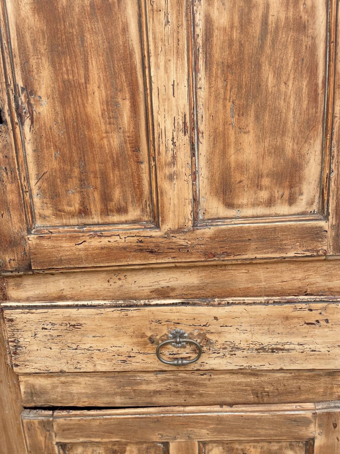 Rustic and vintage wardrobe in raw wood, wabi-sabi style.