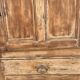 Rustic and vintage wardrobe in raw wood, wabi-sabi style.