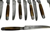 12 couteaux As de trèfle manche en corne, virole métal argenté, fin XIXème