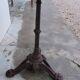 Bistro pedestal table in marble and cast iron lion paws