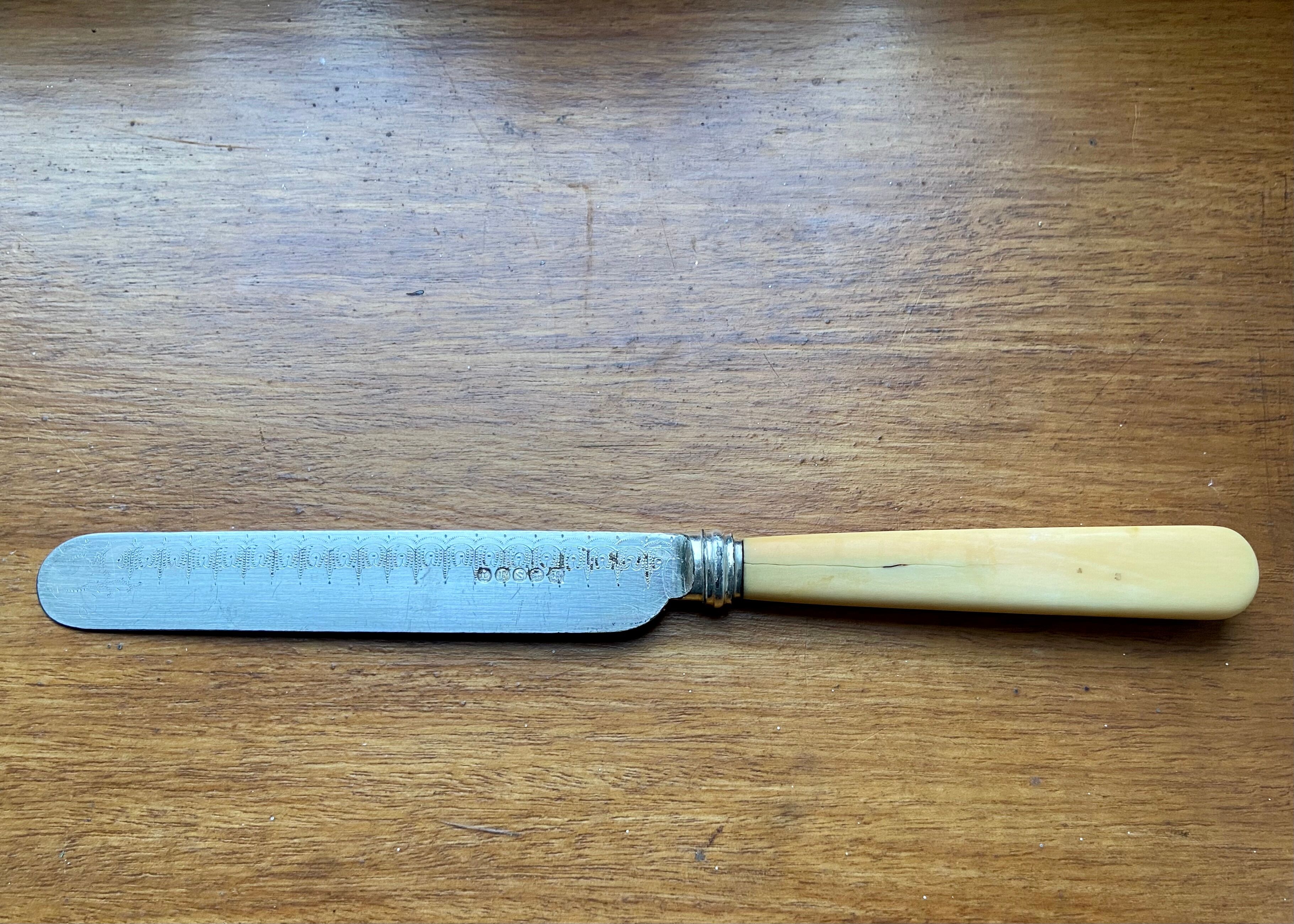 Antique silver-plated butter knife