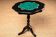 Black wooden gueridon with malachite painted decoration.