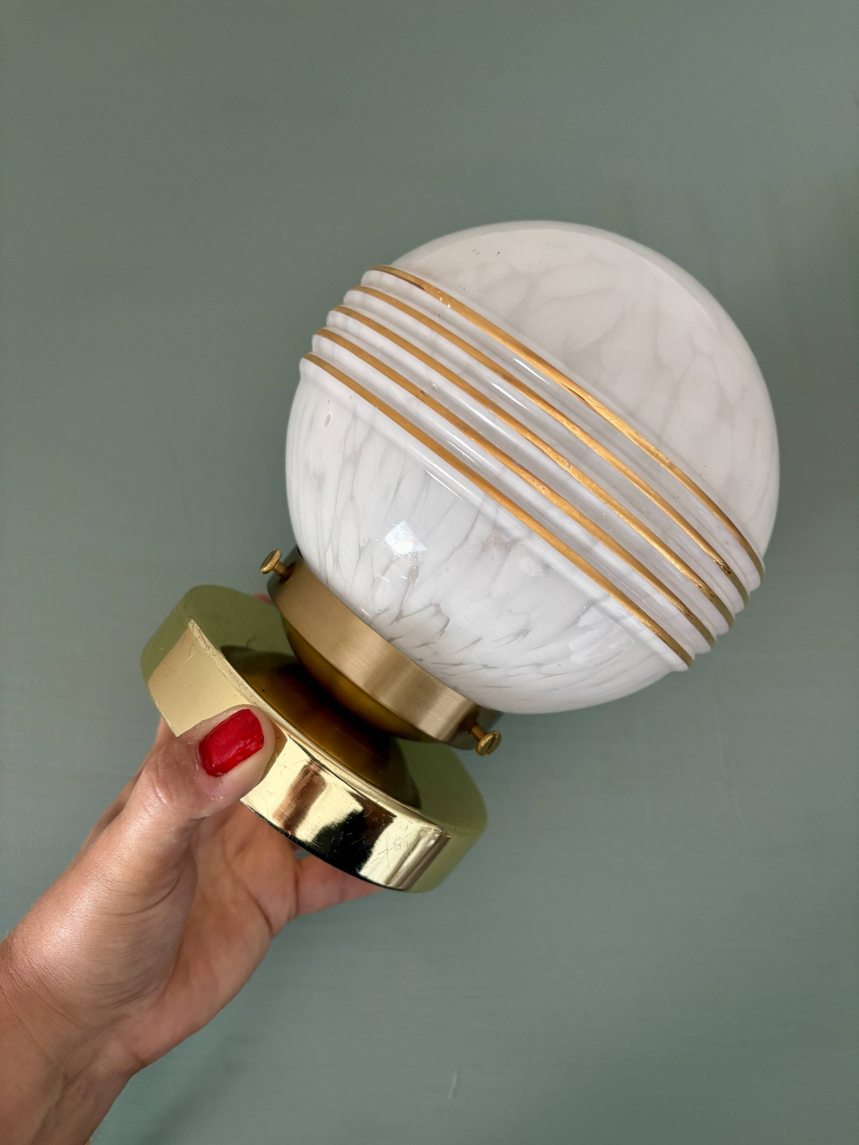 Vintage glass globe wall or ceiling light in white and gold from Clichy.