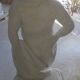 Statue de jardin en pierre reconstituée représentant un jeune faune