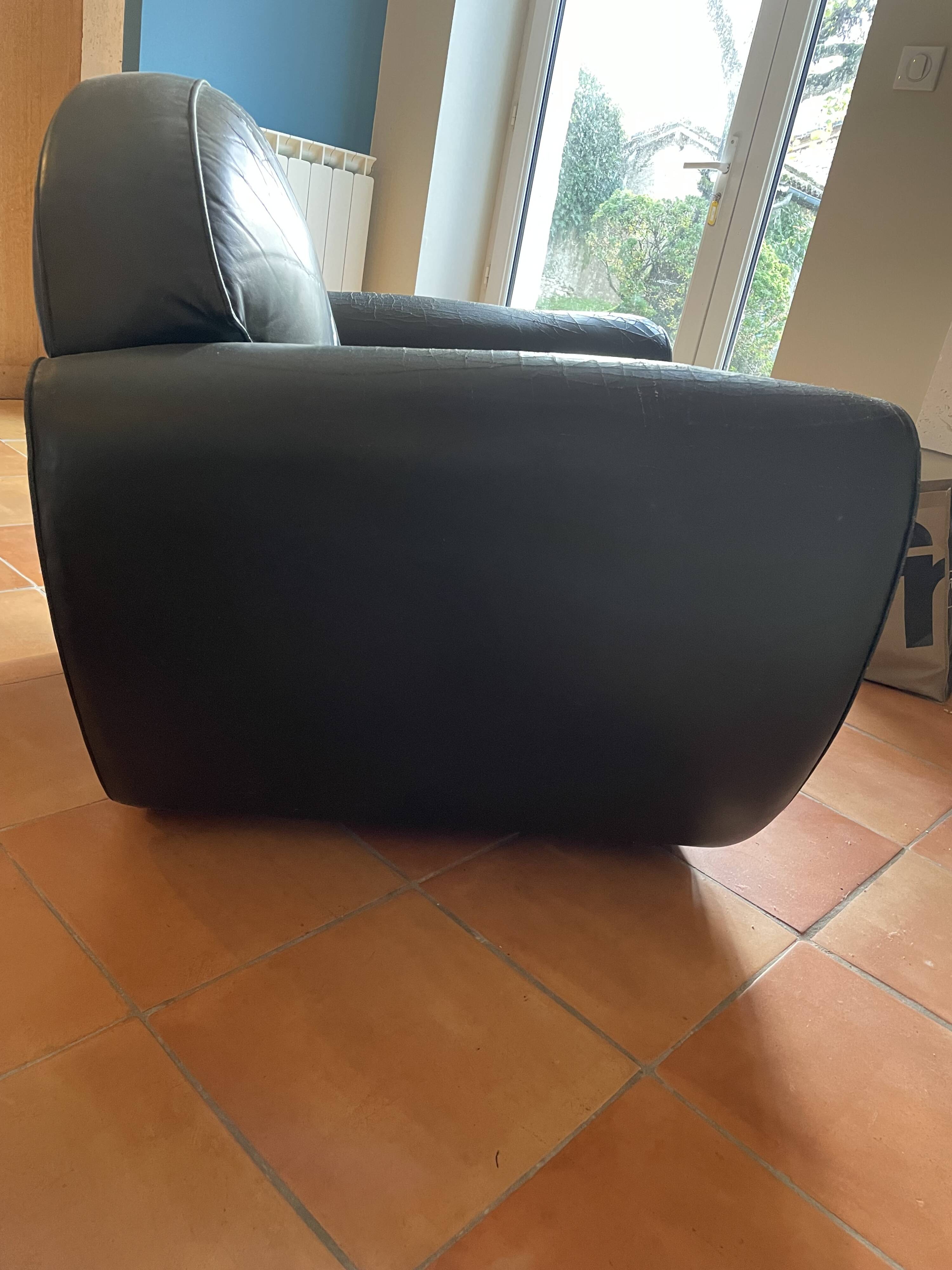 Green leather club chairs