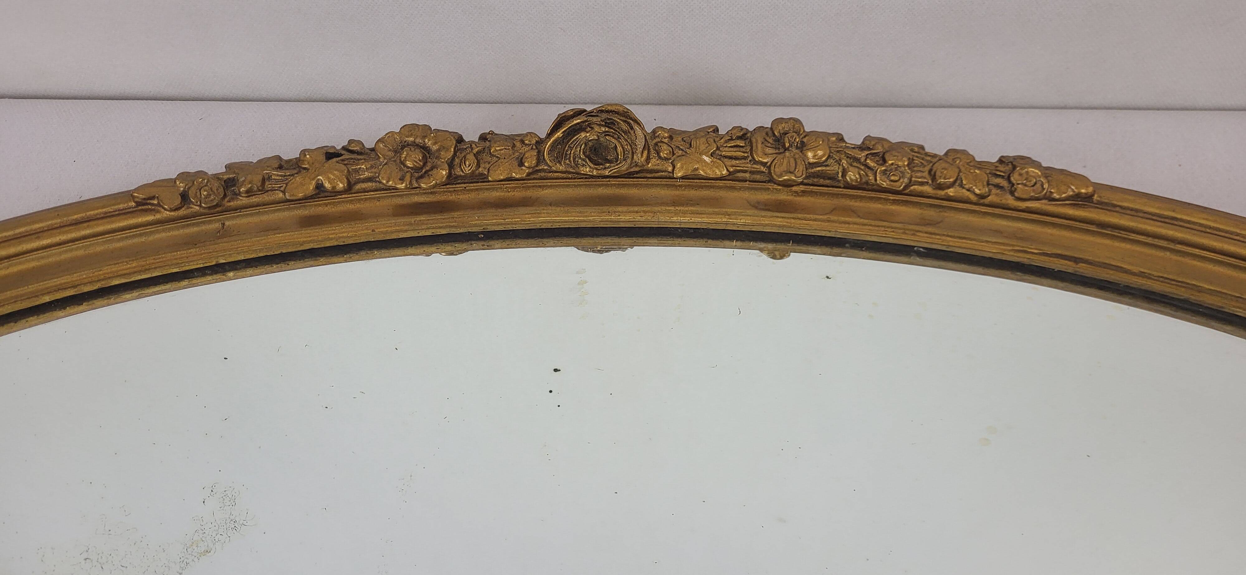 Miroir ovale en bois doré, style Louis XVI