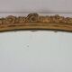 Miroir ovale en bois doré, style Louis XVI