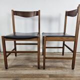Six Scandinavian-style teak and leather dining chairs