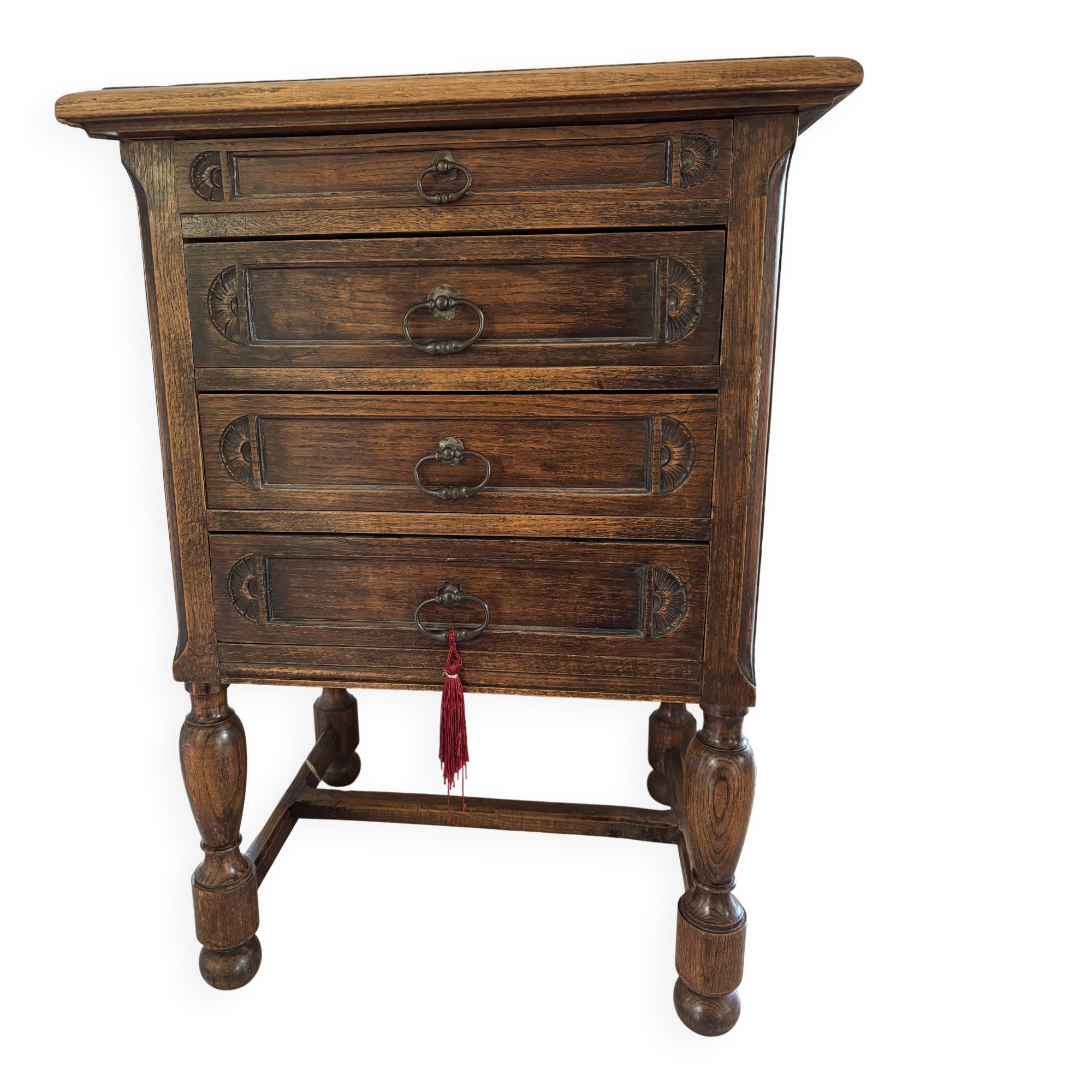 Chiffonier with 4 drawers in carved solid oak in Neo-Tudor English style, 1930.
