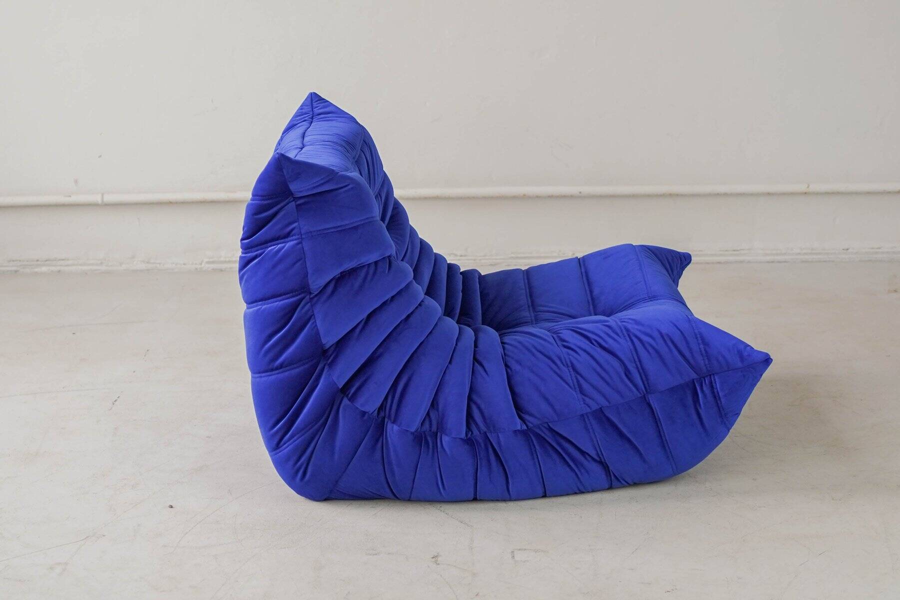 Coral corduroy Togo lounge chair by Michel Ducaroy for Ligne Roset