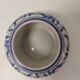 Small round Chinese-style porcelain pot with blue and white decoration