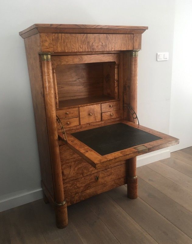 Empire-style secretary desk in burr walnut with detached columns, drop-front, and secret drawer