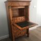 Empire-style secretary desk in burr walnut with detached columns, drop-front, and secret drawer