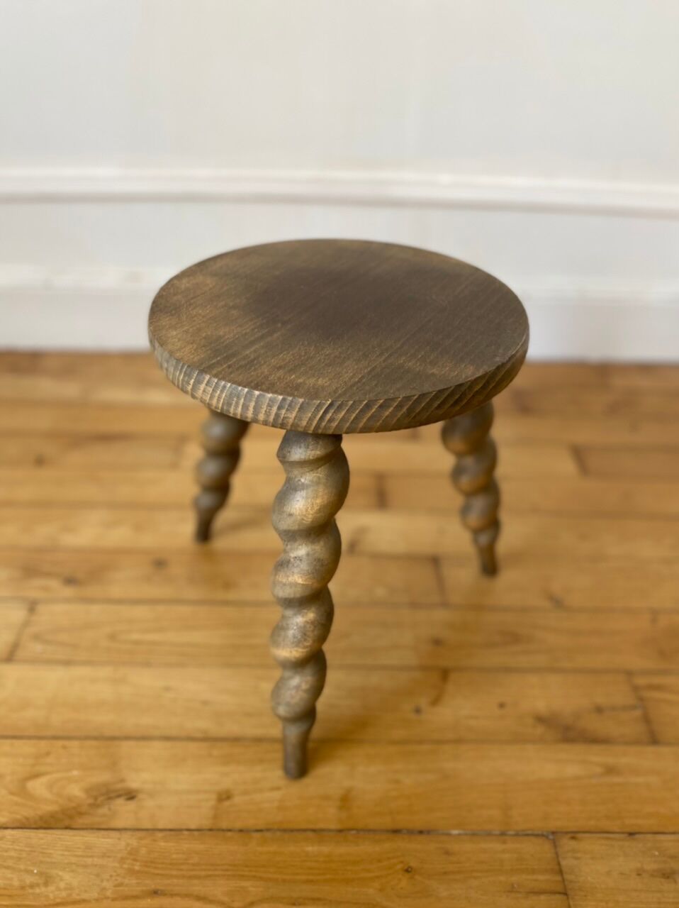 Wooden tripod stool