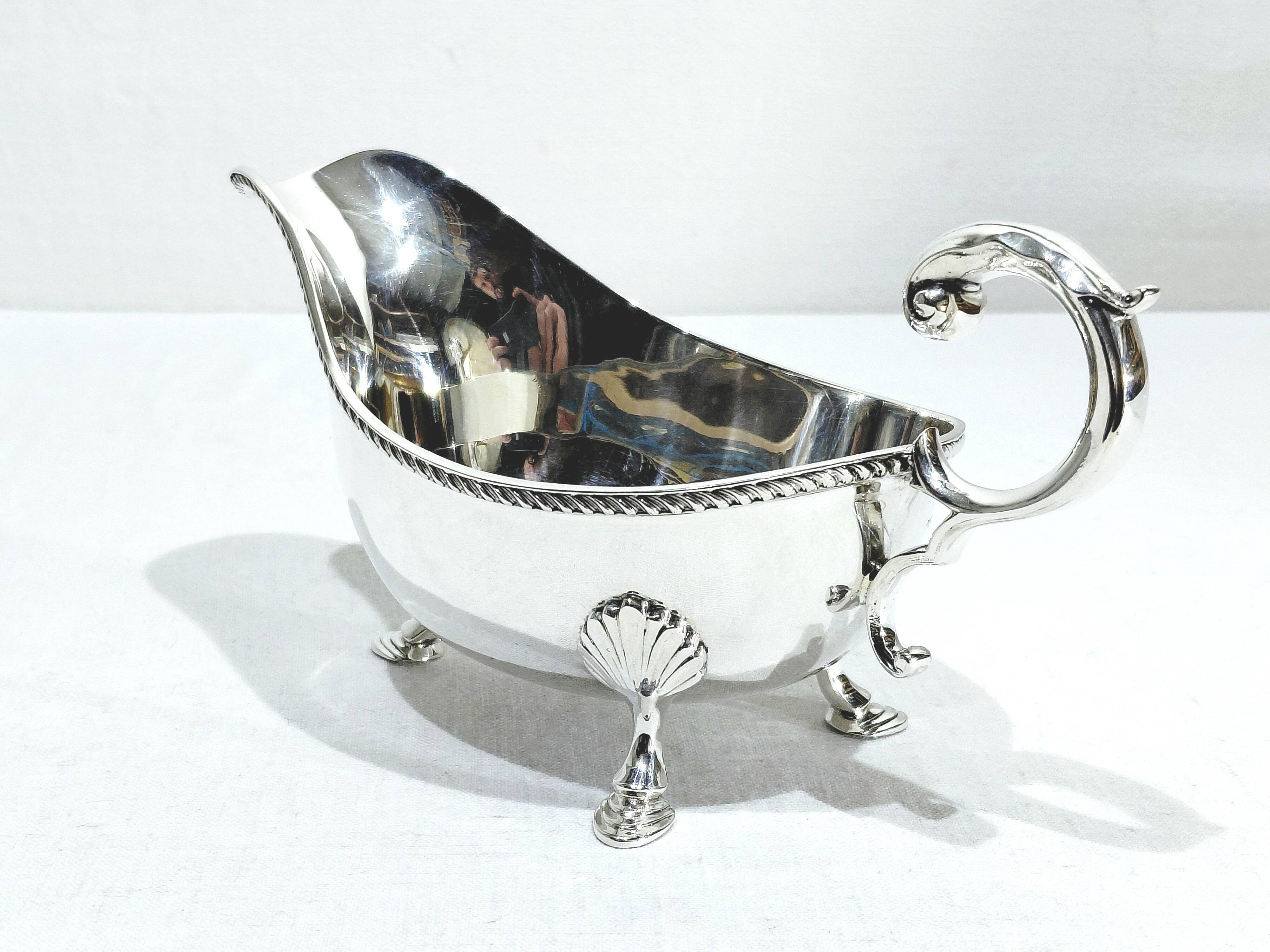 Silver sauceboat, England