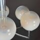 Six arms chandelier in murano glass spheres and chrome. Italy 1960s